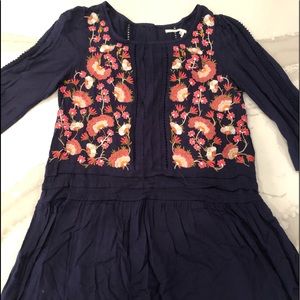 Anthropologie navy embroidered peplum top